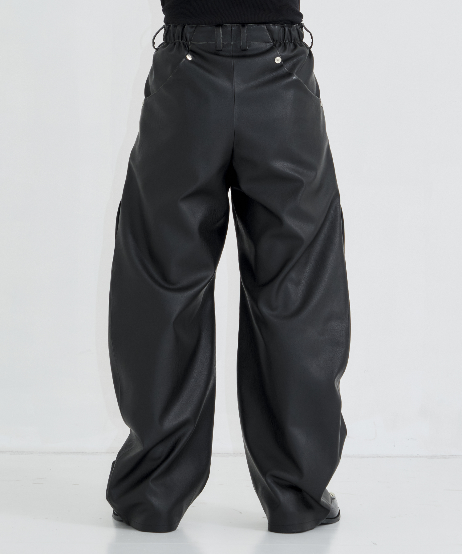CURVED LEG TROUSERS FAUX LEATHER CONZ