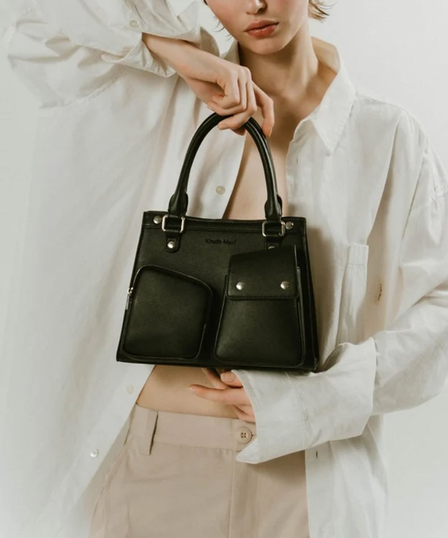 multi pocket hand bag